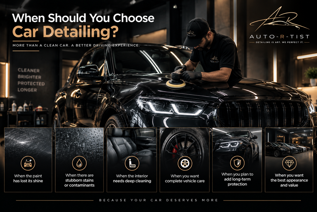 Detailer polishing a black SUV: when should you choose car detailing?
